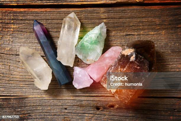 Multiple Semi Precious Gemstones On Board Stock Photo - Download Image Now - Crystal, Crystal Healing, Stone - Object