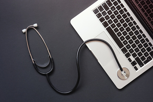 Stethoscope on Computer Laptop keyboard