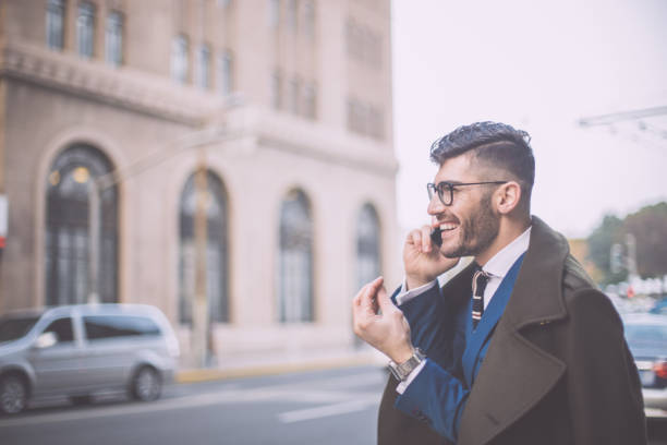 istock Businessman talking on mobile phone 827978220
