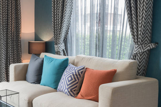 istock colorful pillows on modern sofa in modern living room 827978598