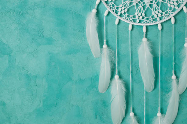istock White dream catcher on aquamarine 827978790
