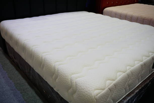 istock Clean folded towel are placed on the bed 827979774