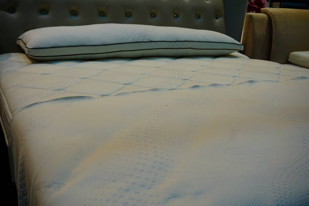 istock Clean folded towel are placed on the bed 827982070