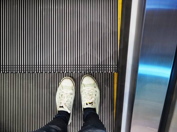 istock Selfie of sneakers with escalator 827988318