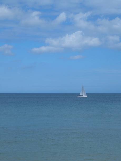 istock Pure White Yacht Sailing Off Cromer/Overstrand, Norfolk 827999872