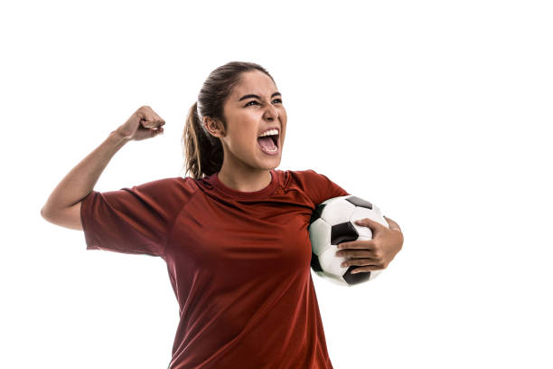 istock Girl wearing red uniform celebrates on white background 828001306