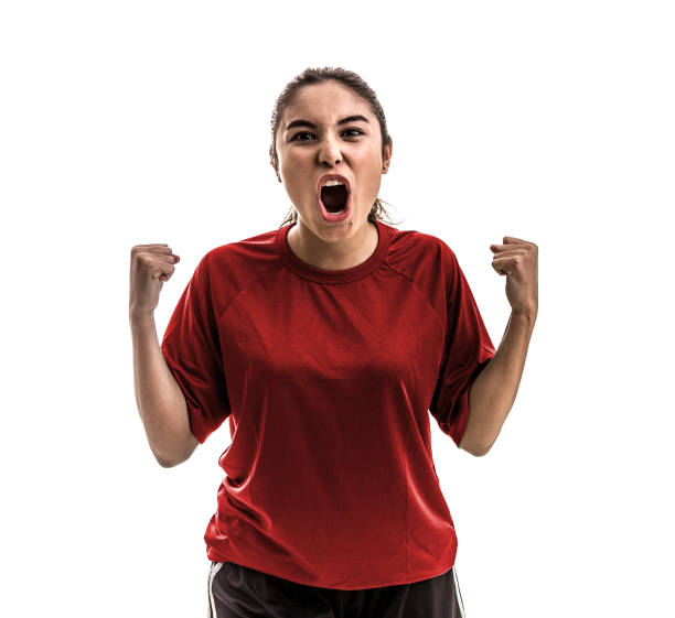 istock Girl wearing red uniform celebrates on white background 828001334