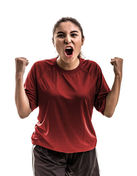 istock Girl wearing red uniform celebrates on white background 828001358