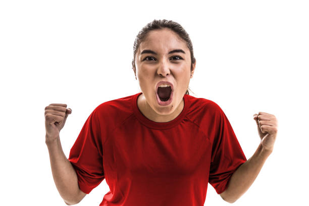 istock Girl wearing red uniform celebrates on white background 828001380