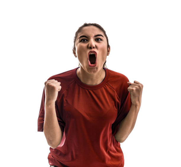 istock Girl wearing red uniform celebrates on white background 828004462
