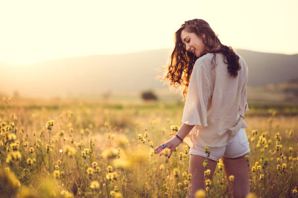 istock Attractive Girl In Summer Landscape 828005834