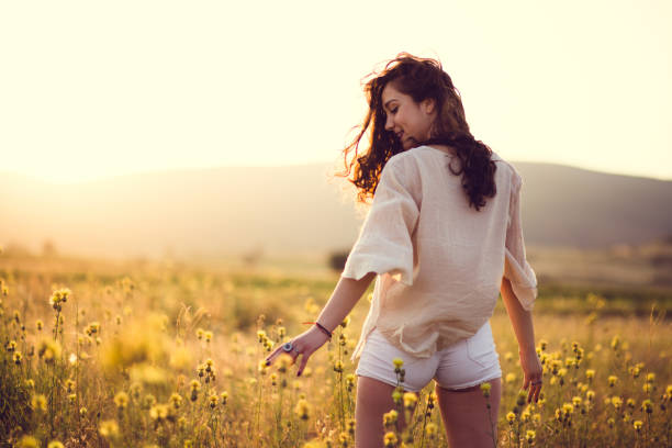 istock Sensual Girl In Yellow Field 828006026