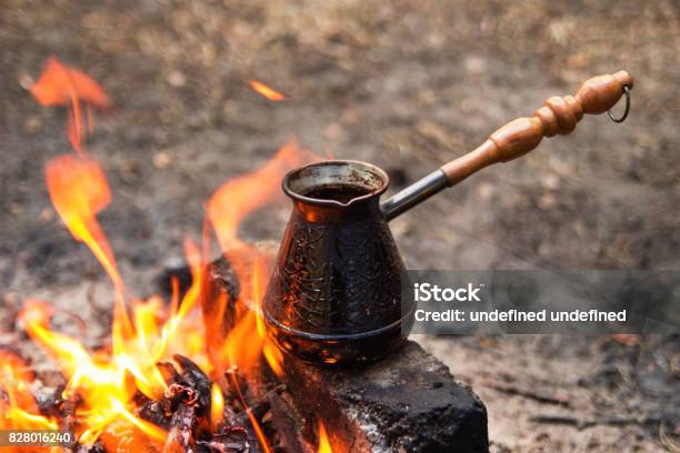 Metal Cezve With Hot Flavored Coffee On A Bonfire Closeup Stock Photo - Download Image Now