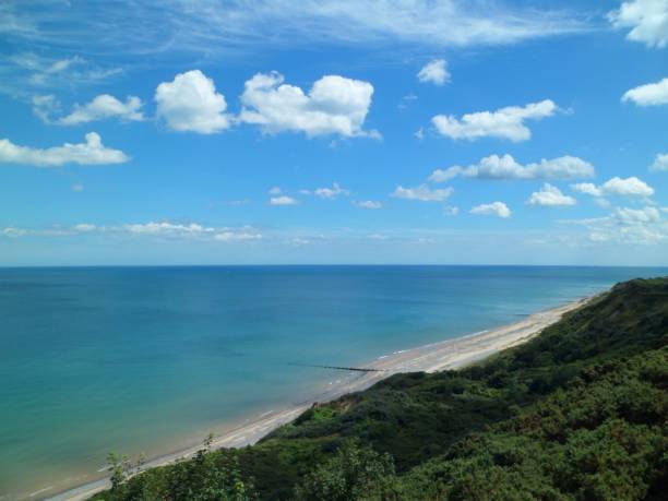 istock Overstrand Beach From The Cliffs In Summertime 828022786