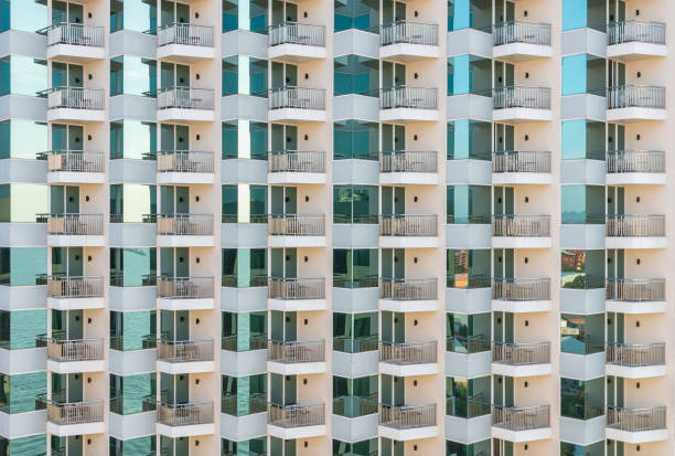 istock Pattern of balconies and windows of apartment building. 828023390