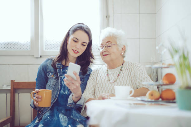 istock Social worker is visiting a senior woman 828048264