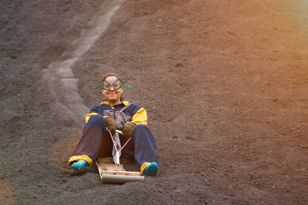 Young woman on volcano board tour in NIcaragua