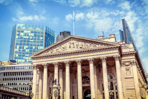 The facade of the Royal Exchange in the City of London The facade of the Royal Exchange in the City of London bank of england stock pictures, royalty-free photos & images