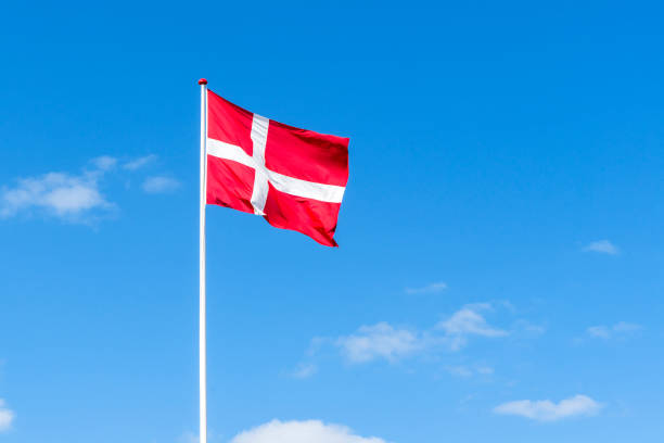 istock The danish flag in red and white waving in the wind 828091002