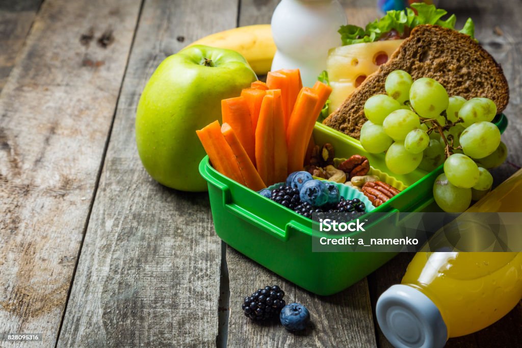 Healthy school lunch box Healthy school lunch box on rustic background, copy space Lunch Box Stock Photo