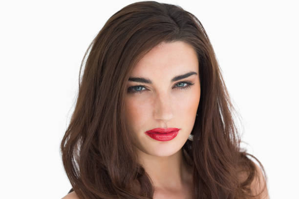istock Woman with red lips staring at camera 828102372