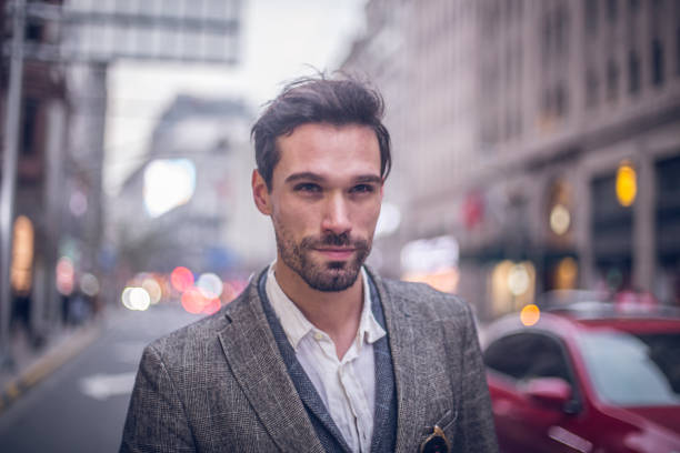 istock Charming man standing on the street 828103618