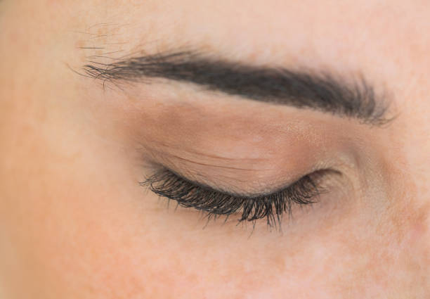istock Close up of shut eyes 828104402