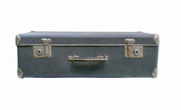 istock The vintage grey suitcase isolated on white 828108108
