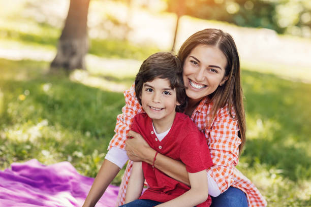 istock Mother and son in the park 828121512