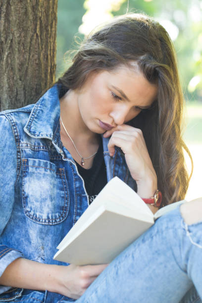 istock She most likes to read a book in nature 828122254