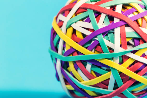 istock Rubber band ball on blue background 828122280