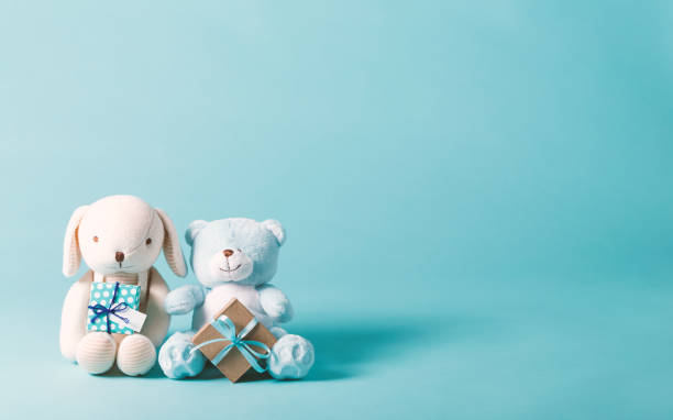 istock Child celebration theme with gifts and stuffed animals 828122714