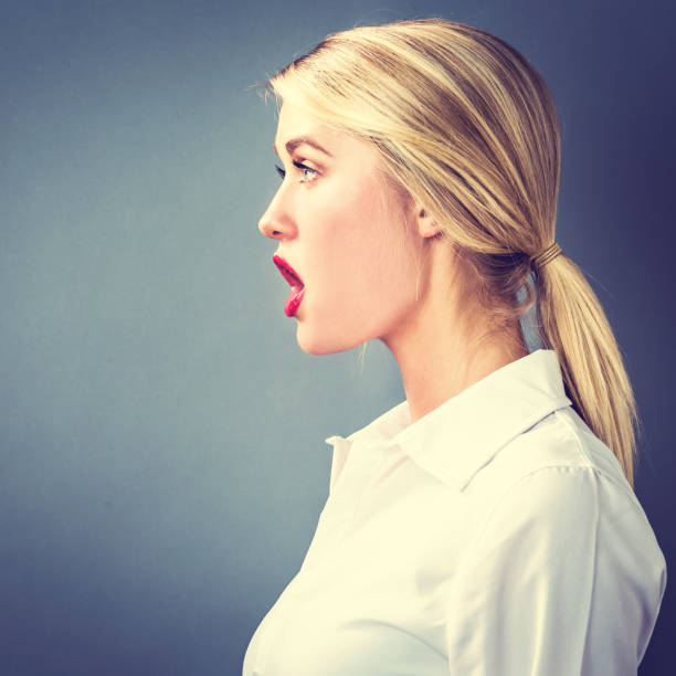 istock Profile of a young woman 828126052