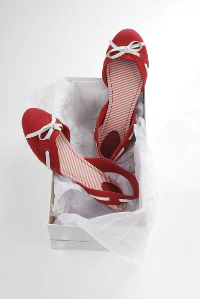 istock Sexy red women shoes in the box 828126366