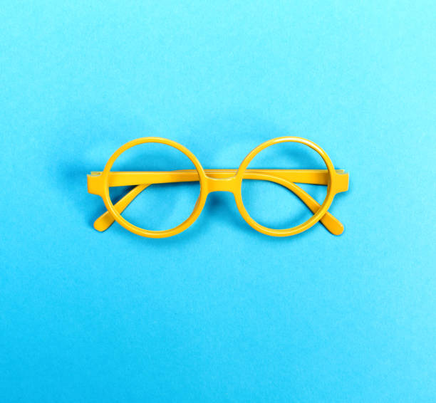 istock Round glasses on a bright blue background 828131490