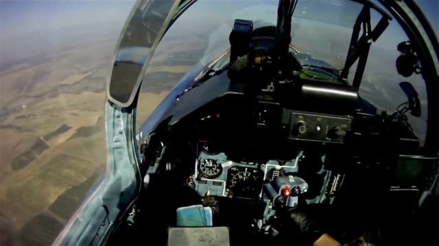 The flight of a military aircraft. View from the cockpit.