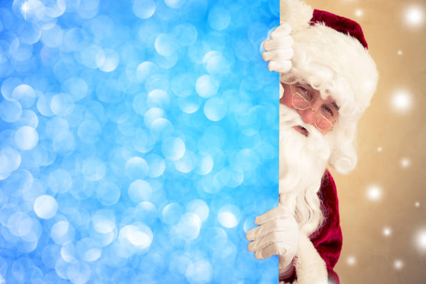 istock Santa Claus holding banner 828144896