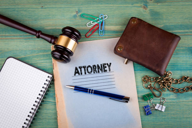 istock Attorney concept. Notebook on a bright green background. Office stationery accessories 828145072