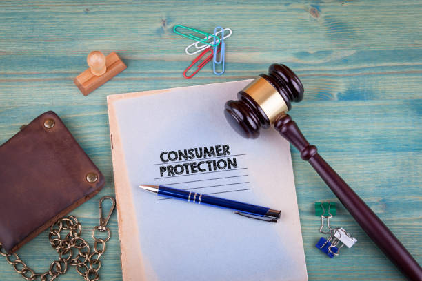 istock Consumer Protection. Notebook on a bright green background. Office stationery accessories 828146196