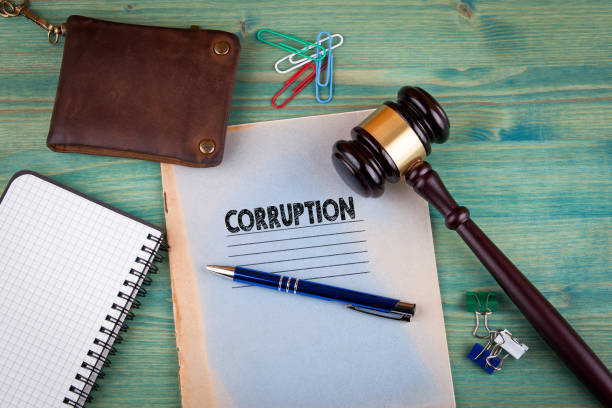 istock Corruption concept. Notebook on a bright green background. Office stationery accessories 828149354