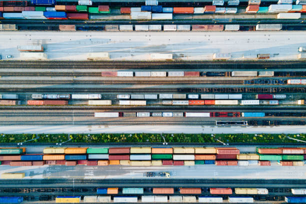 istock Cargo Trains and Containers at a Terminal 828151812