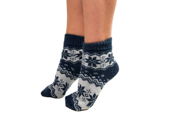 istock Winter socks on his feet 828156106