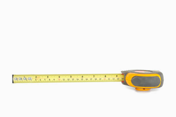 istock Yellow measuring tape partly unrolled 828167372