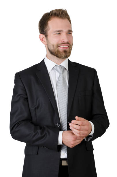 istock Portrait of young businessman standing in studio 828193590