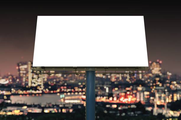 istock Large billboard against sky at night. 3D rendered illustration. 828197246