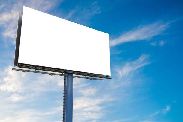 istock Large billboard against blue sky. 3D rendered illustration. 828197264