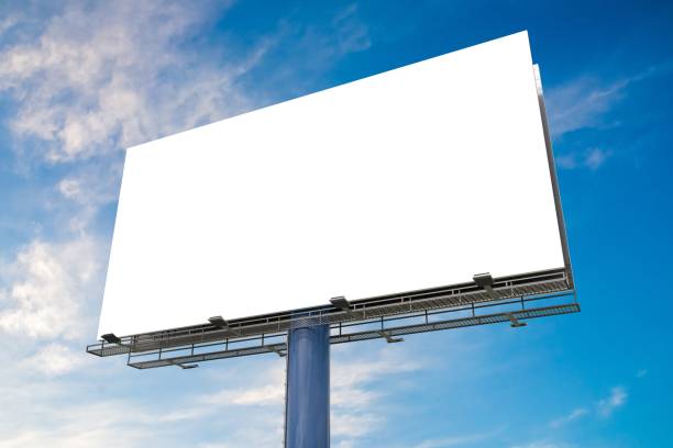 istock Large billboard against blue sky. 3D rendered illustration. 828197376