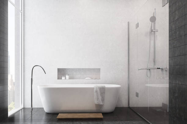istock White bathroom, black tiles, shower 828197766