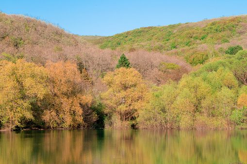 Autumn nature of the Crimea is a beautiful. Mountain lake in autumn, Sevastopol.