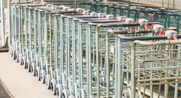 istock rusty trolley luggage online in an airport 828202020